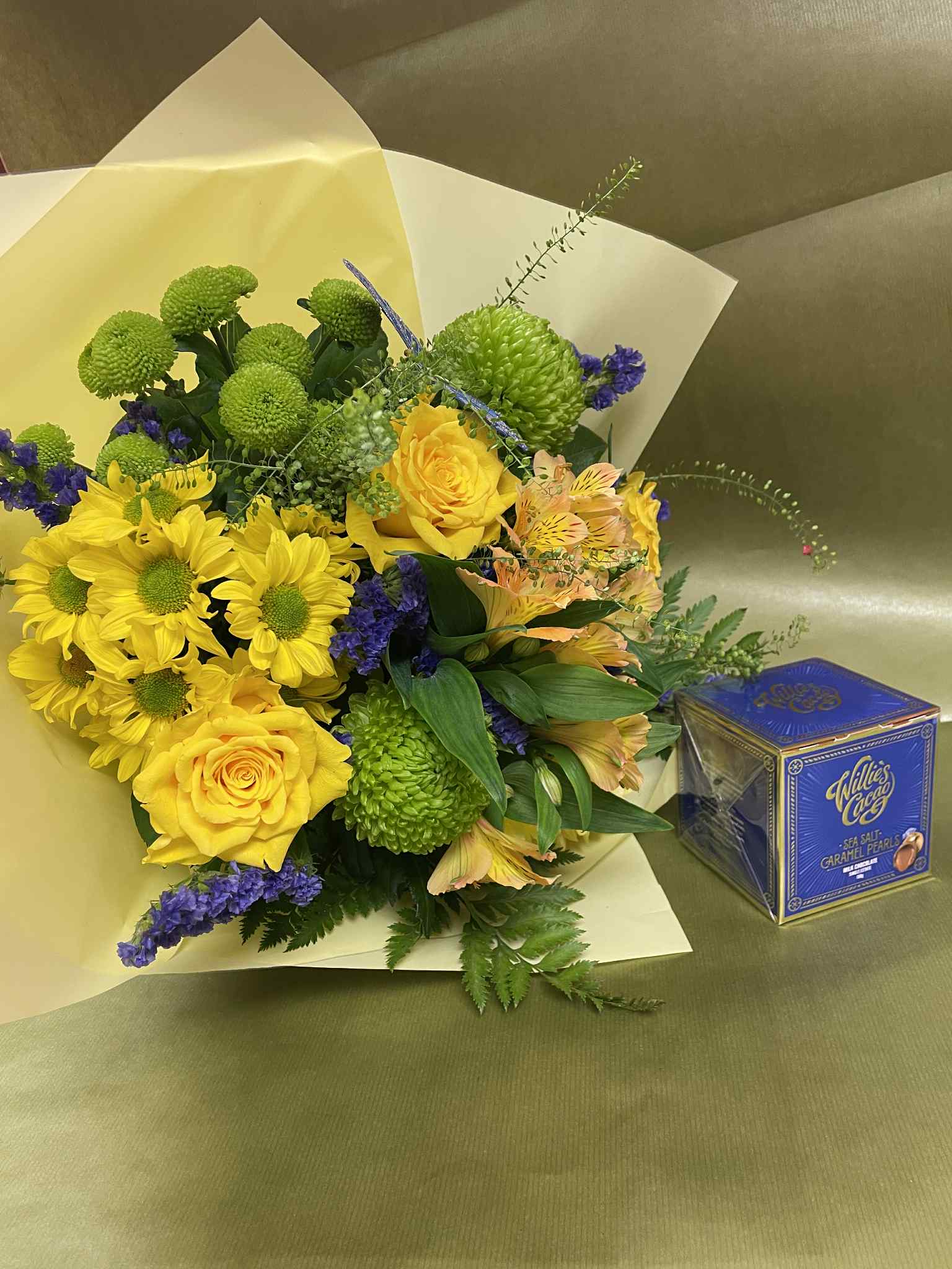 Small Hand tied bouquet with Willie’s Cacao Praline Truffles. Flowers color selection: Yellow and purple, purple and white, pink and white , red and pink.