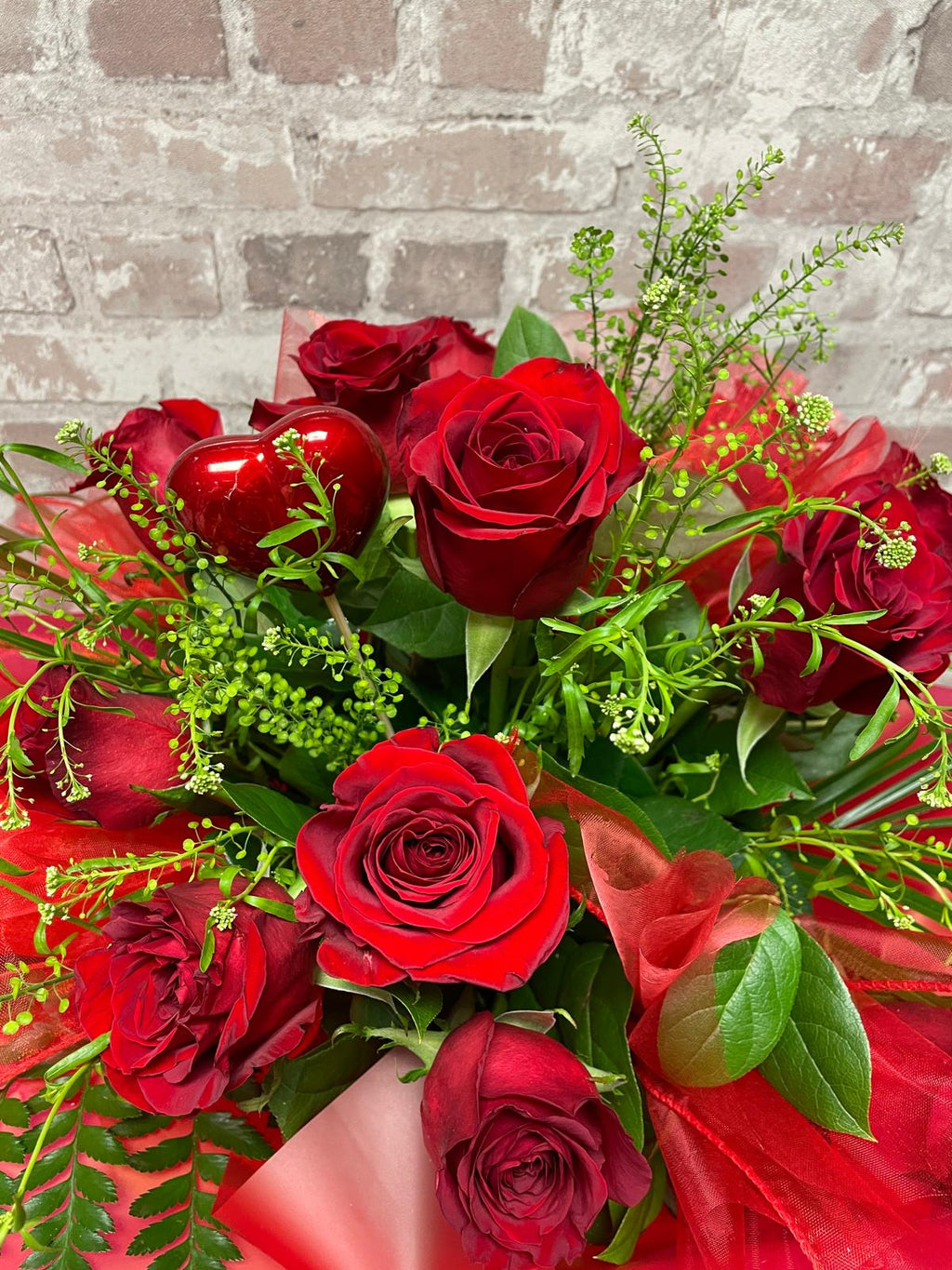 LOVE POTION. 12 RED ROSES BOUQUET
