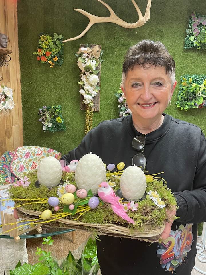 Annabella Noviello of Great Victoria Blossoms with a handcrafted arrangement